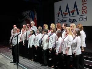 The all-audiologist AAA Choir, directed by David Speidel and organized by Bob DiSogra, started off the General Session with the National Anthem.