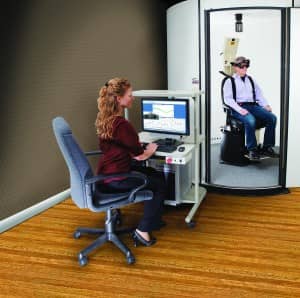 Figure 2. Auto-Traverse rotational chair with dark enclosure used for dynamic SVV testing (OVAR). Photo courtesy of Micromedical Technologies, Chatham, Ill.