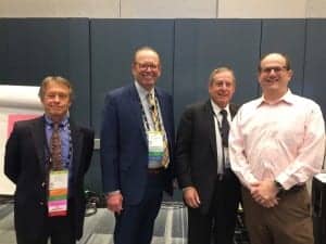 Jay Hall, Ian Windmill, Barry Freeman, and healthcare actuarian Jason Freeman presented the feature session, "Audiology and Medicare: Where Economic Reality Collides with Hearing Care."