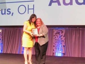 AAA President Lisa Christensen presented 2019 Program Chair Erin Miller with the President's Award for her outstanding job in formulating the convention program.